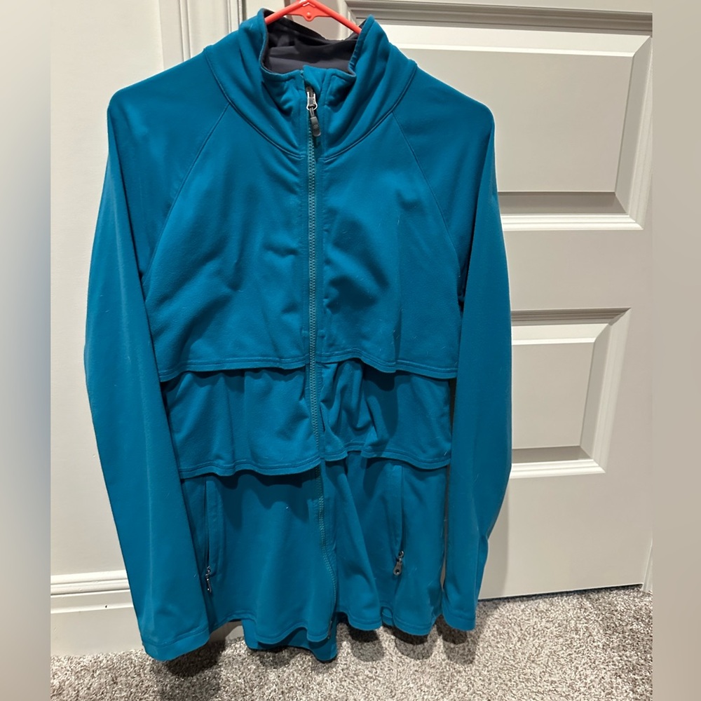 Athleta teal ruffled zip with pockets size M